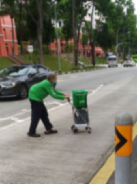 elderly grab food deliverer