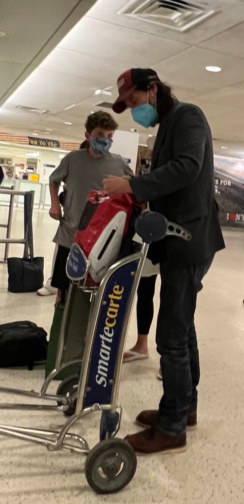 Keanu Reeves makes a young fan's day at airport