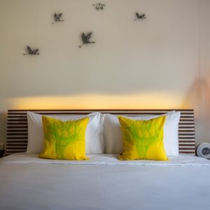 A beautifully-designed room within the Aviary Hotel